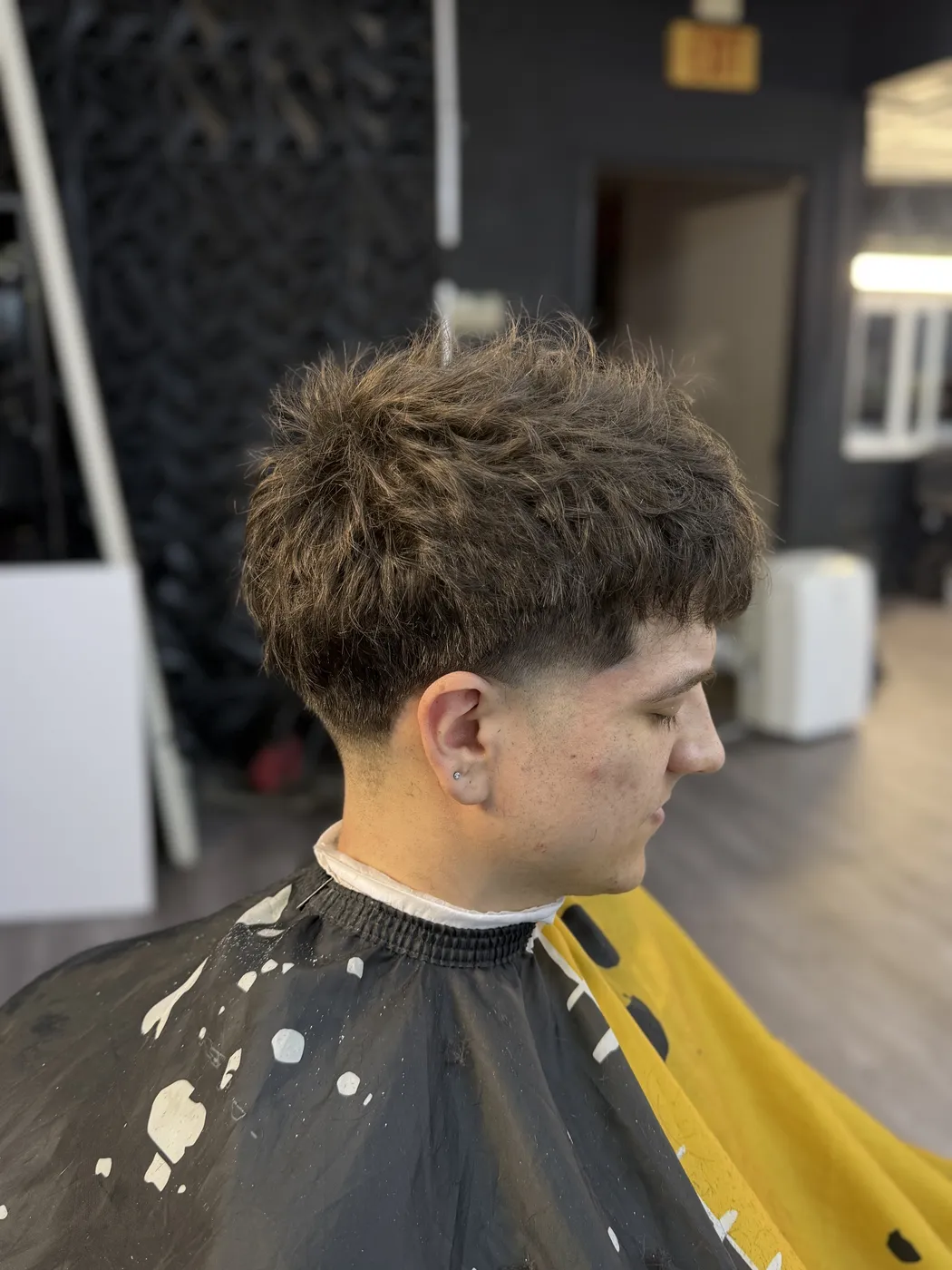 Skin fade with a crisp lineup by Josh